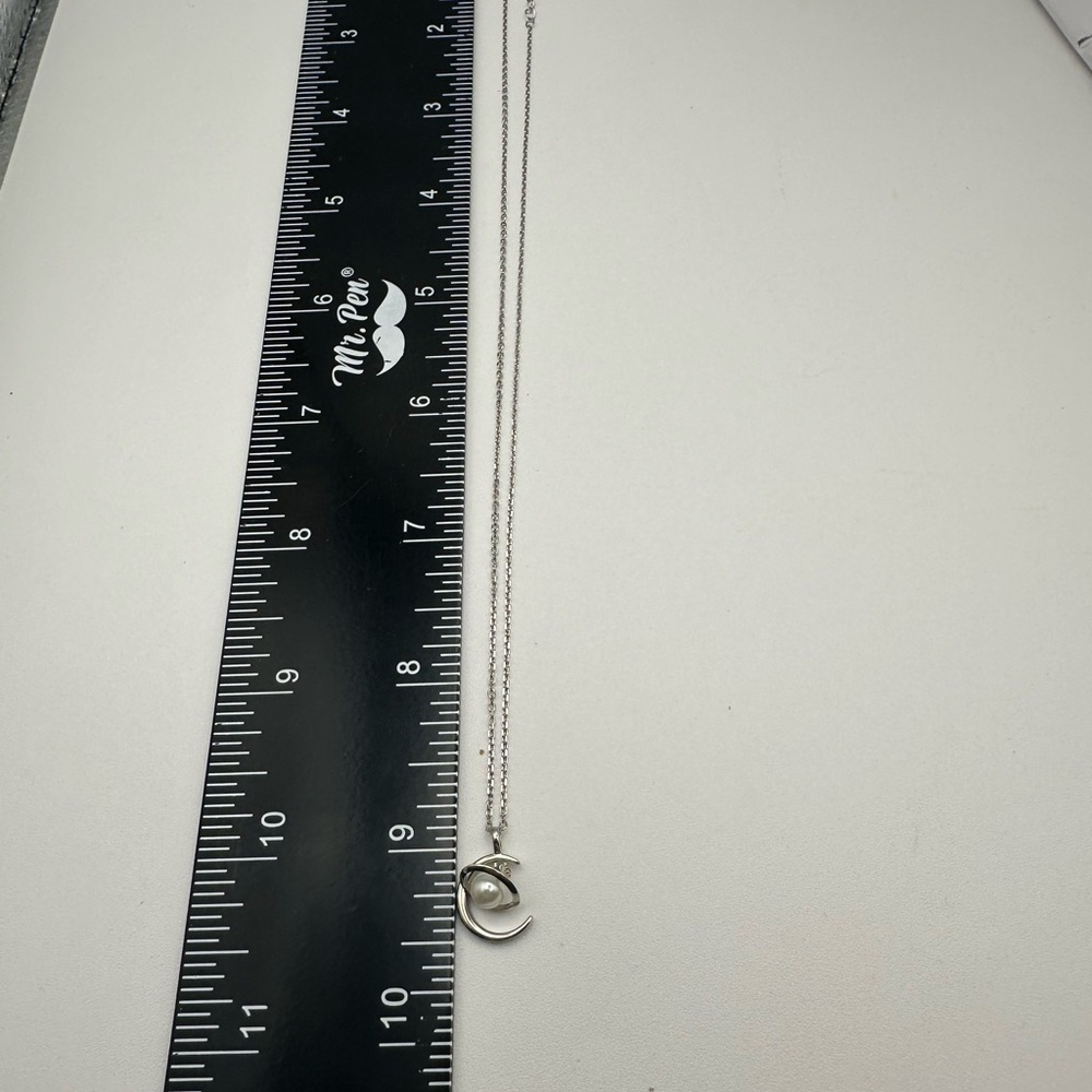 Elegant Silver Moon and Pearl Planet Pendant Necklace - Picture 4 of 7